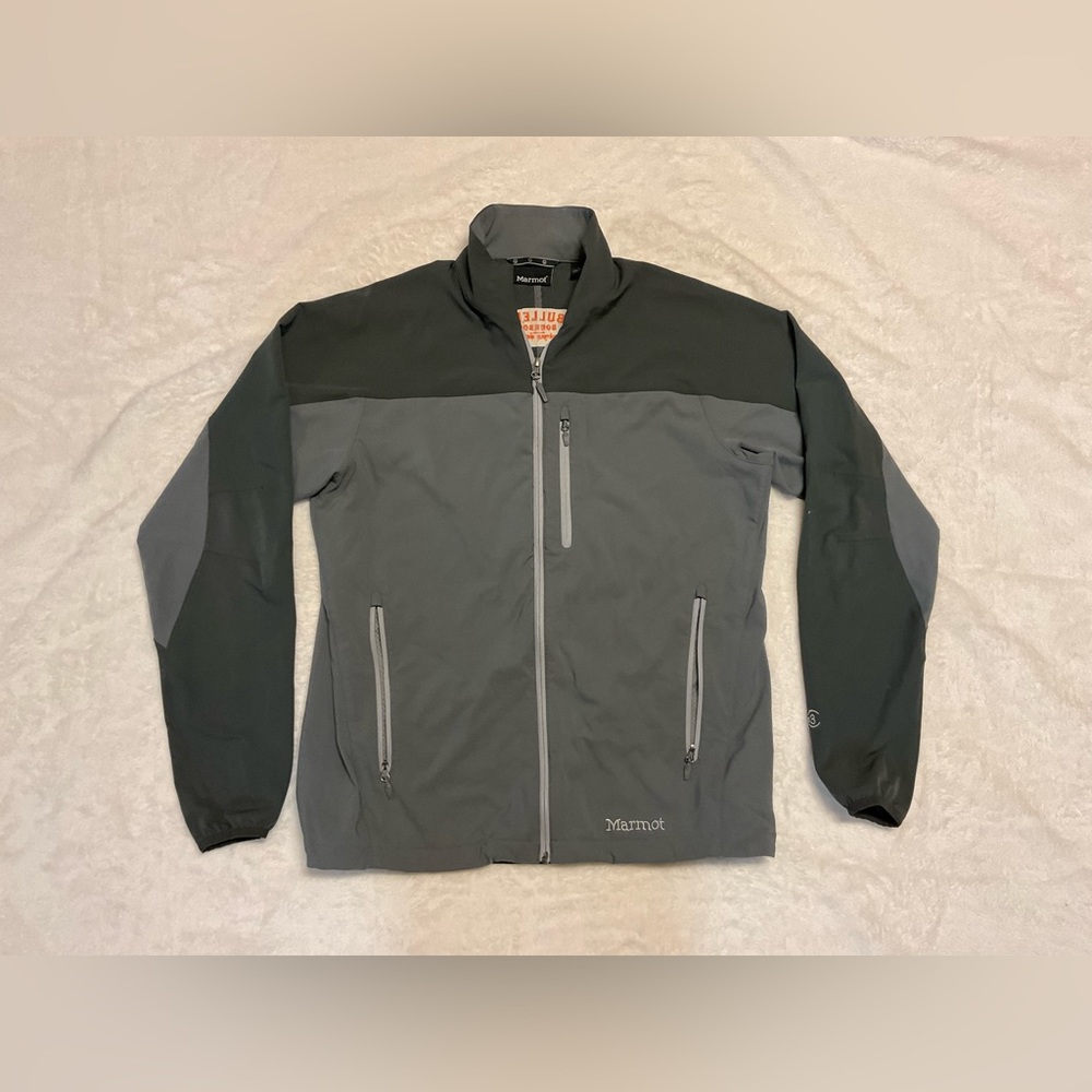 Marmot grey & black jacket. Size large. Great condition. Bulleit Bourbon logo.